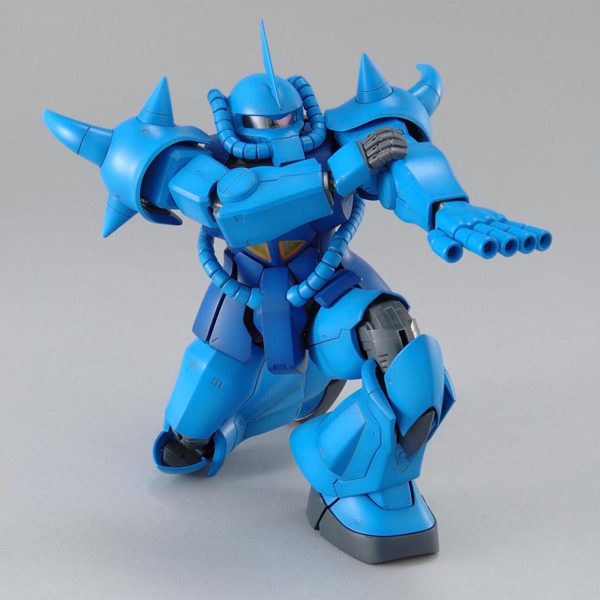 Assembled MG Gouf ver. 2.0 model kit crouching firing its finger vulcan guns