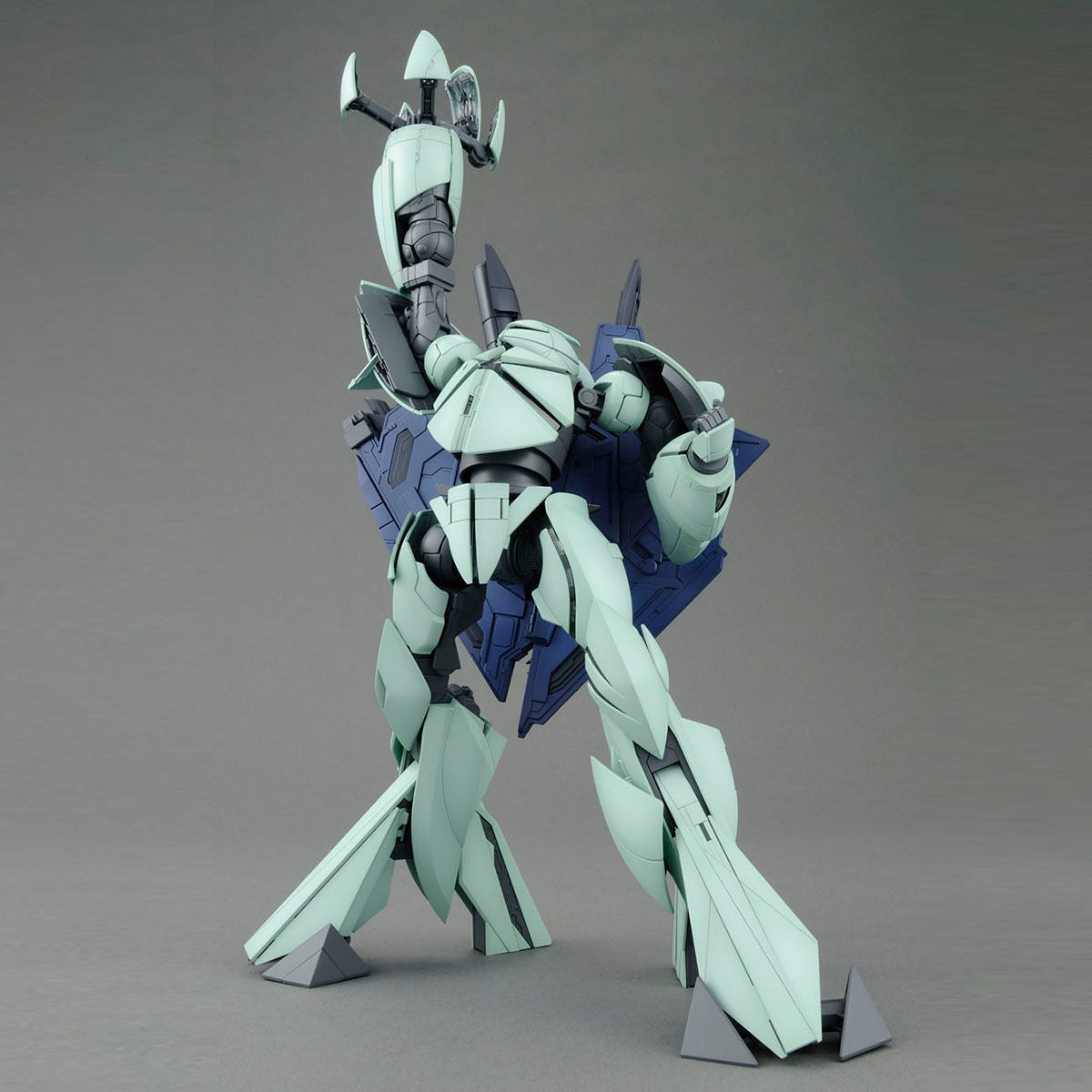 MG Turn X assembled model kit posed with right arm pointing up
