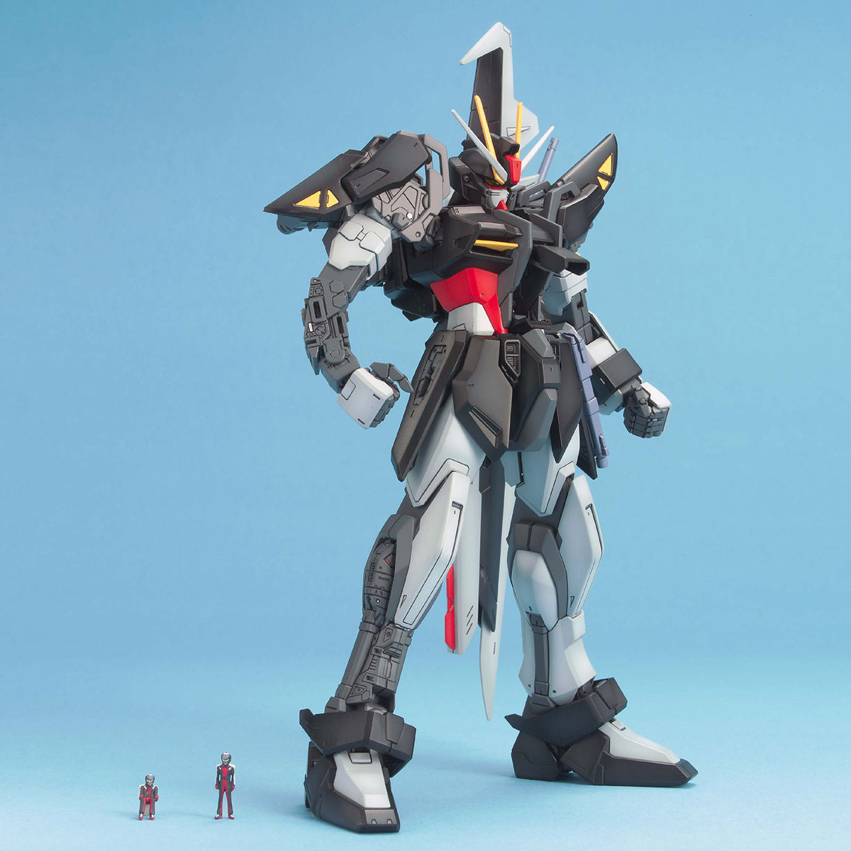 MG Strike Noir Gundam model kit assembled kit showing off moving parts and armour removal