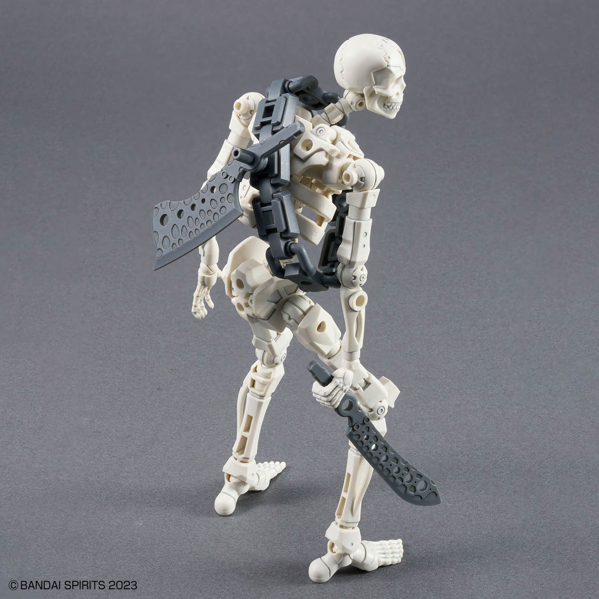 Assembled 30MF DLROskeleton model kit rear view with accessories and weapons equipped