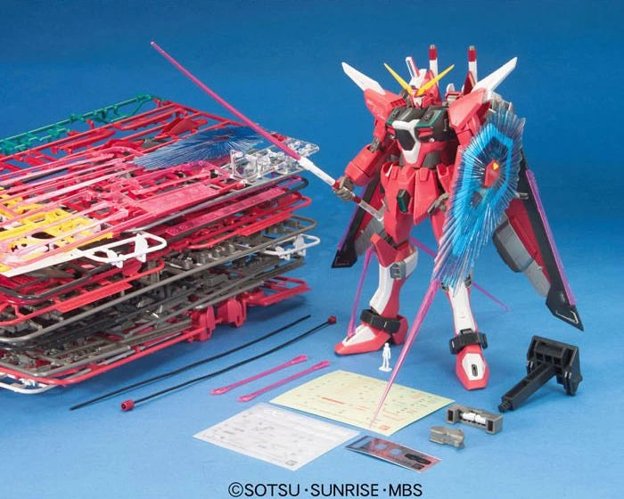 MG Infinite Justice Gundam model kit built alongside unbuilt kit