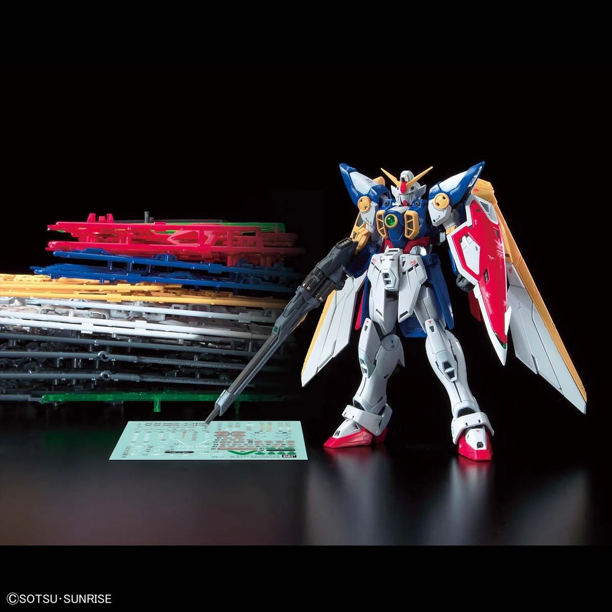 RG Wing Gundam model kit completed model side by side with the kit's runners