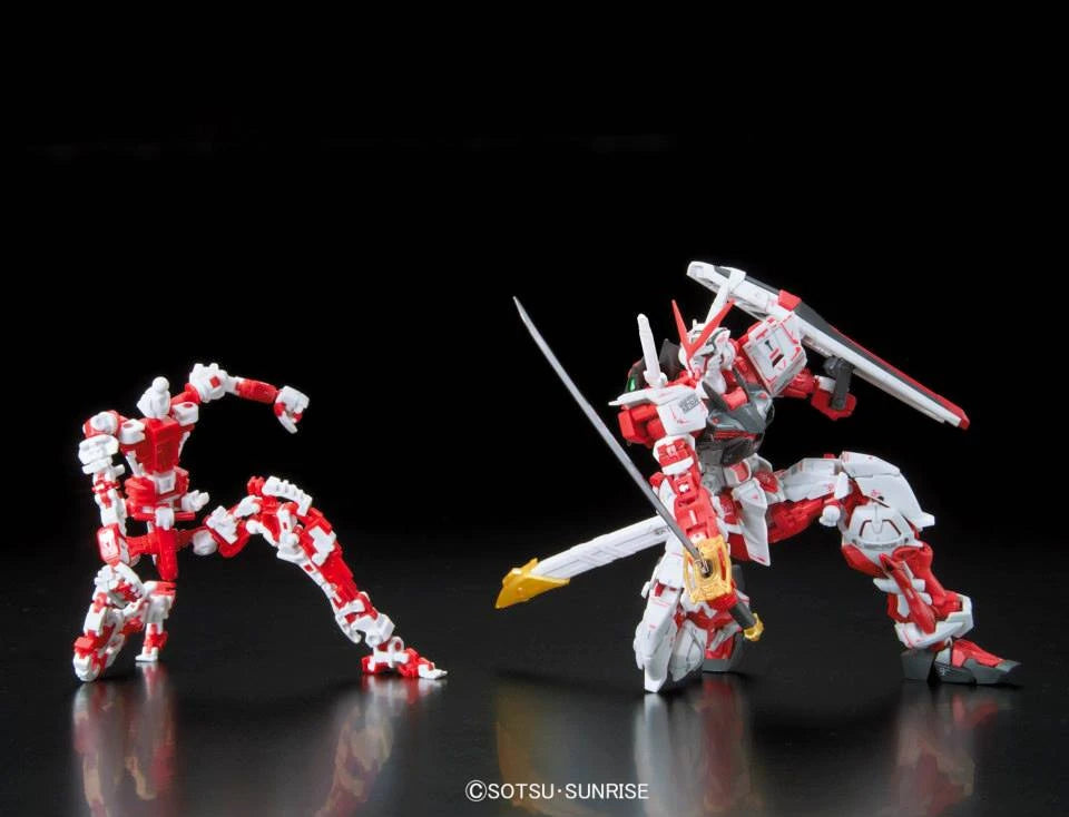 RG Astray Red Frame Gundam model kit crouching side by side with inner frame