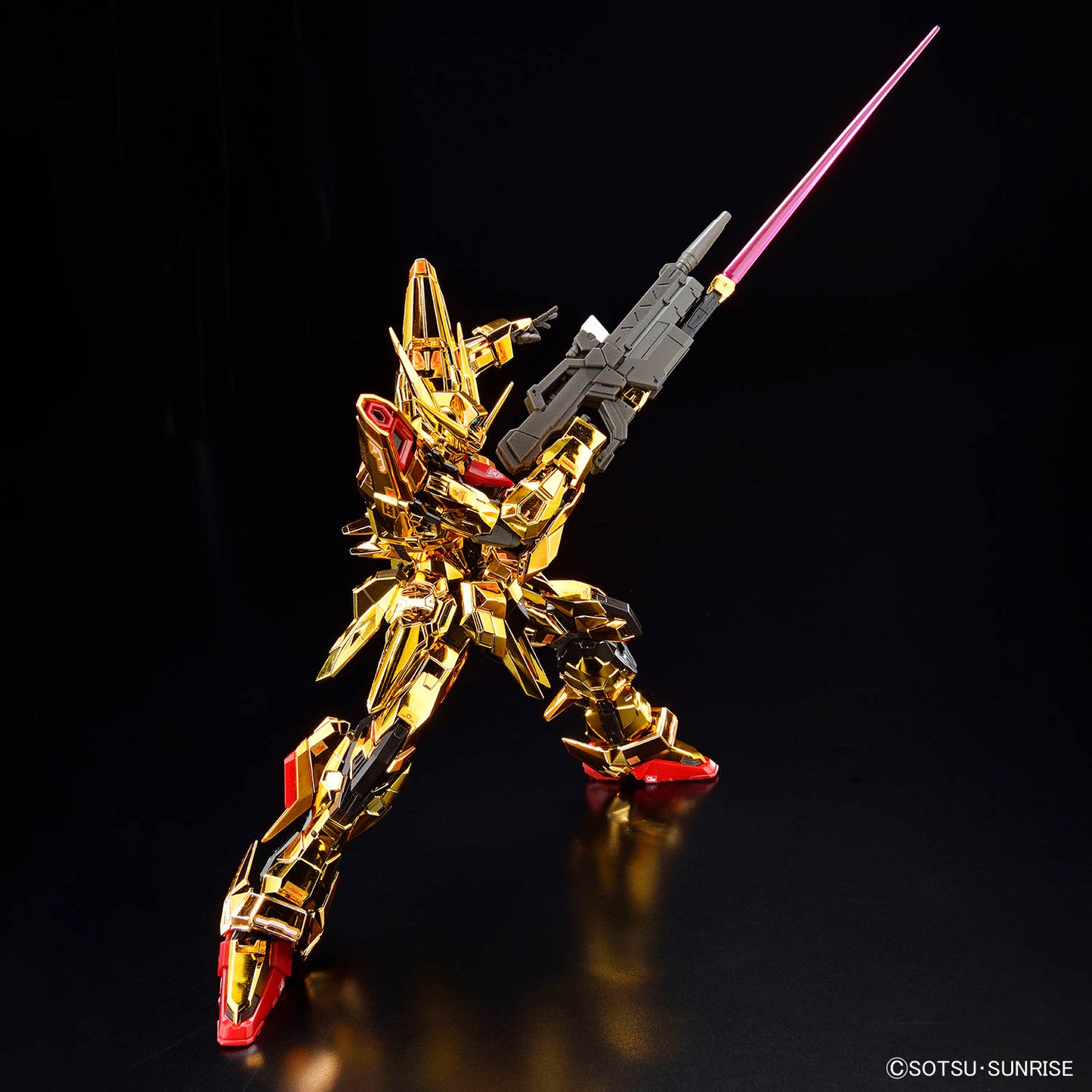RG Akatsuki Gundam assembled model kit striking a pose with its beam rifle