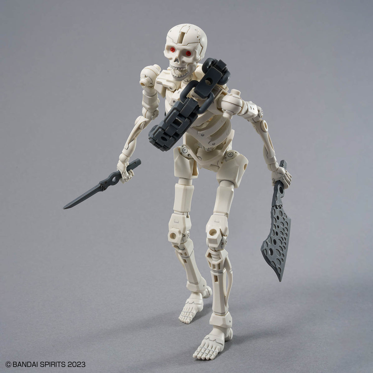 Assembled 30MF DLROskeleton model kit walking pose with weapons in hand