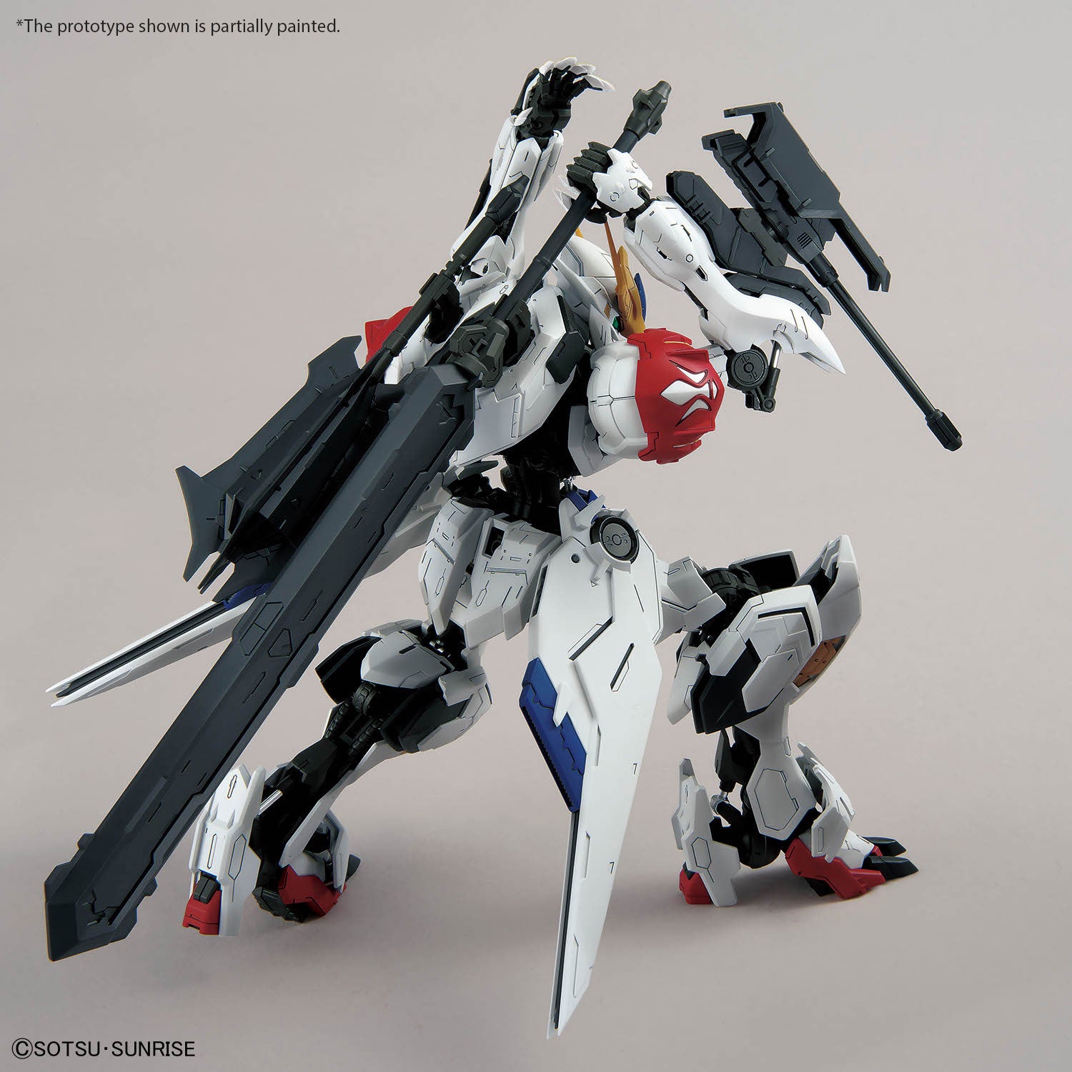 MG Gundam Barbatos Lupus assembled model kit showing off its flexibility to grab weapons from its backpack